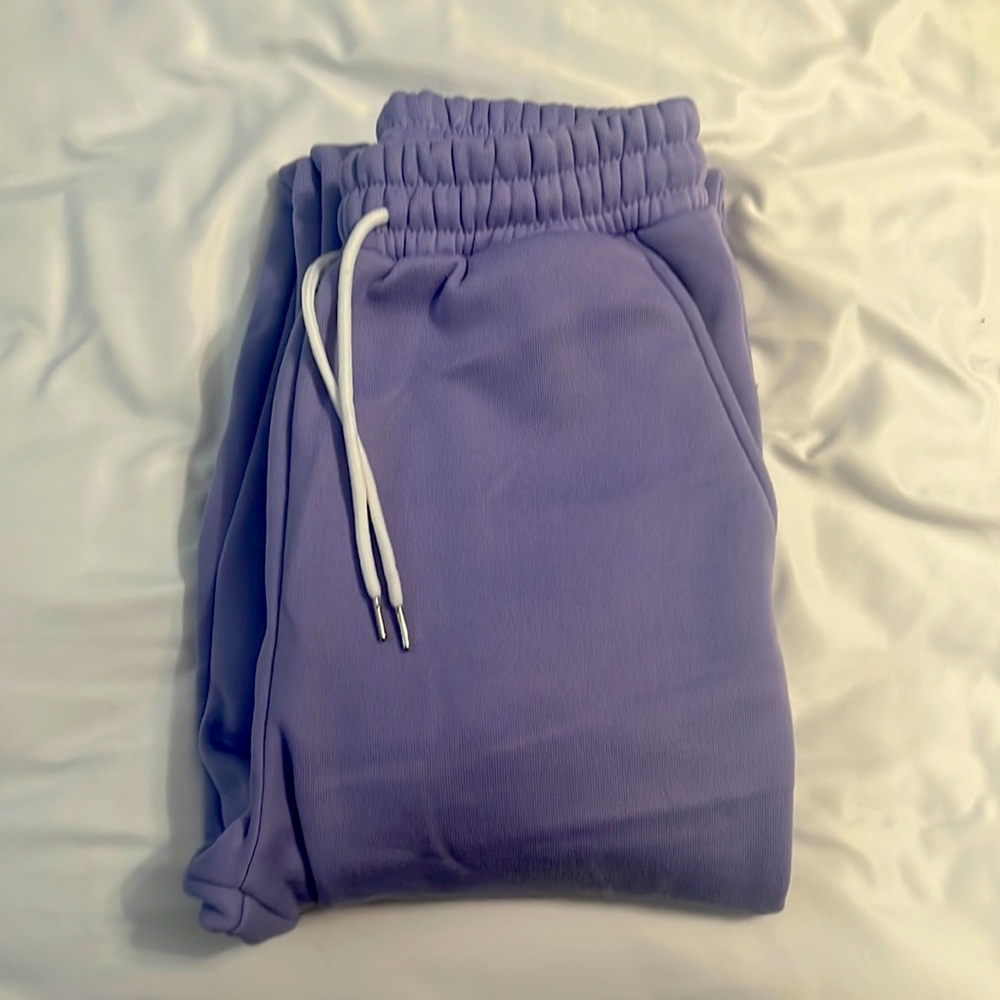 Warm purple sweatpants, lilac color, and comfortable!